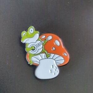 Frog Playing Banjo Enamel Pin with Orange Mushroom
